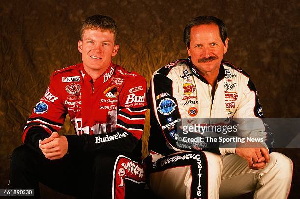 Dale Earnhardt and Dale Earnhardt Jr. Pose for a photo on October 5, 1999 in Mooresville, North Carolina.
