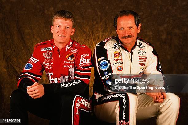 Dale Earnhardt and Dale Earnhardt Jr. Pose for a photo on October 5, 1999 in Mooresville, North Carolina.