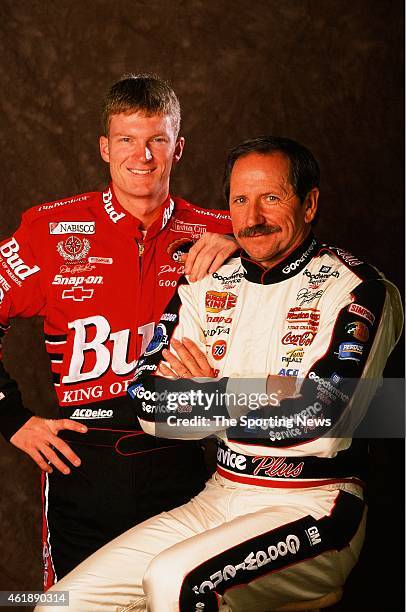 Dale Earnhardt and Dale Earnhardt Jr. Pose for a photo on October 5, 1999 in Mooresville, North Carolina.