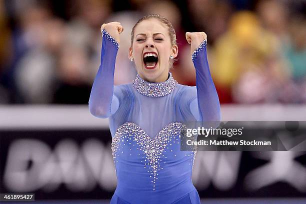 Gracie Gold celebrates at the end of her routine in during the ladies free skate at the Prudential U.S. Figure Skating Championships at TD Garden on...