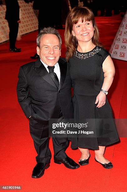 Warwick Davis and Samantha Davis attend the National Television Awards at 02 Arena on January 21, 2015 in London, England.