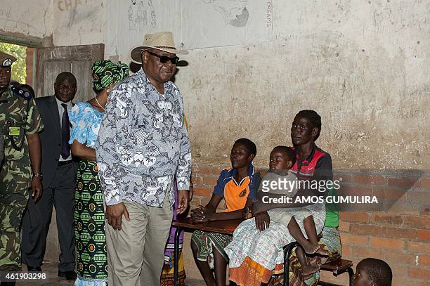 Malawi President Arthur Peter Mutharika visits flood victims at Bangula Primary School camp in the most southern district of Nsanje, on January 21,...