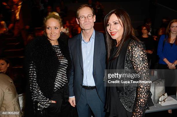 Janine Kunze , Michael Mueller and Sabine Thomalla attend the Guido Maria Kretschmer show during the Mercedes-Benz Fashion Week Berlin Autumn/Winter...