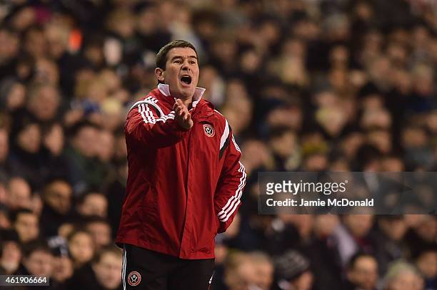 Nigel Clough, manager of Sheffield United gives instructions during the Capital One Cup Semi-Final first leg match between Tottenham Hotspur and...