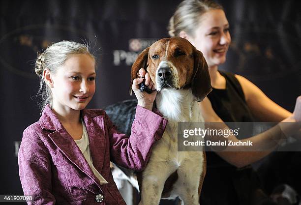 Sisters Faith and Sophia Rogers with their dogs Erik, a Whippet; Joy, a Great Dane and Bobby, an American Foxhound attend the 2015 Westminster Week...