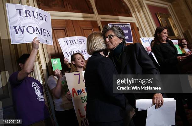 Sen. Barbara Boxer embraces Sen. Patty Murray after speaking at a press conference advocating women's health rights January 21, 2015 at the U.S....