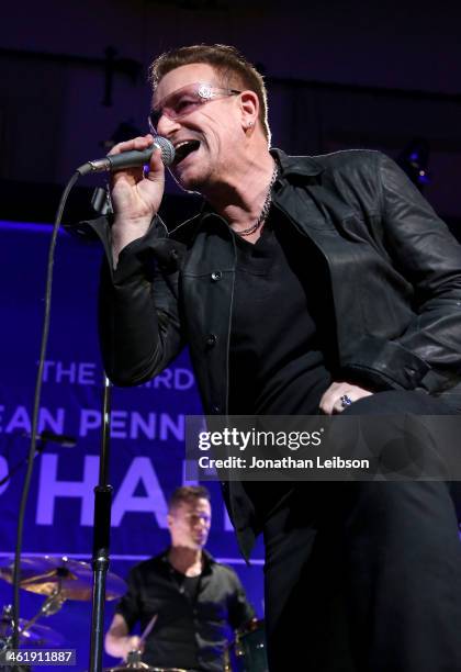 Bono and Larry Mullen Jr of U2 perform onstage during the 3rd annual Sean Penn & Friends HELP HAITI HOME Gala benefiting J/P HRO presented by Giorgio...