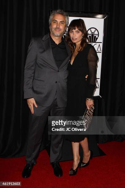 Filmmaker Alfonso Cuaron and author Sheherazade Goldsmith attend The 39th Annual Los Angeles Film Critics Association Awards at InterContinental...