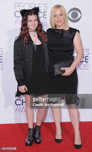 Actress Patricia Arquette and daughter Harlow Olivia Calliope Jane arrive at The 41st Annual People's Choice Awards at Nokia Theatre L.A. Live on...