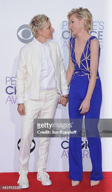 Ellen DeGeneres and Portia de Rossi arrive at The 41st Annual People's Choice Awards at Nokia Theatre L.A. Live on January 7, 2015 in Los Angeles,...
