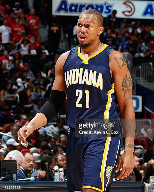David West of the Indiana Pacers reacts as he walks to the bench during the game against the Atlanta Hawks at Philips Arena on January 21, 2015 in...