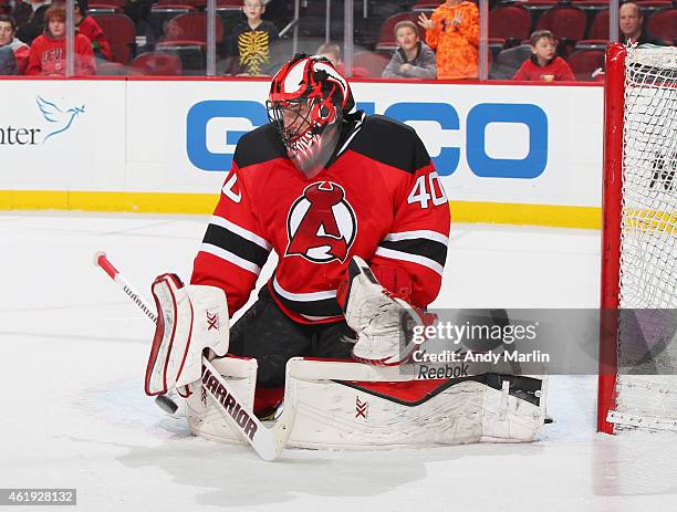 Scott Clemmensen of the Albany Devils makes a save against the Bridgeport Sound Tigers during the game at the Prudential Center on January 21, 2015...