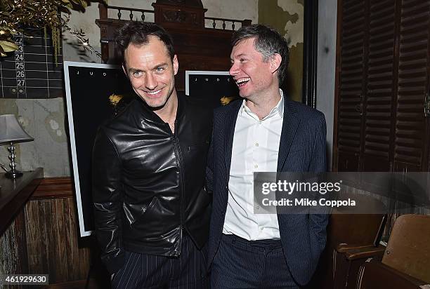 Actor Jude Law and Director Kevin Macdonald attend the "Black Sea" New York Screening after Party at Macao on January 21, 2015 in New York City.