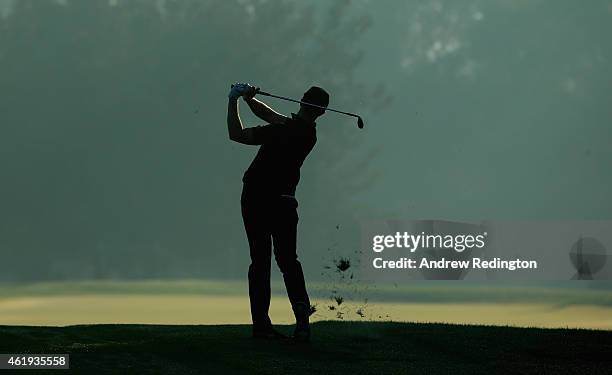 Oliver Fisher of England plays his second shot on the second hole during the second round of the Commercial Bank Qatar Masters at Doha Golf Club on...