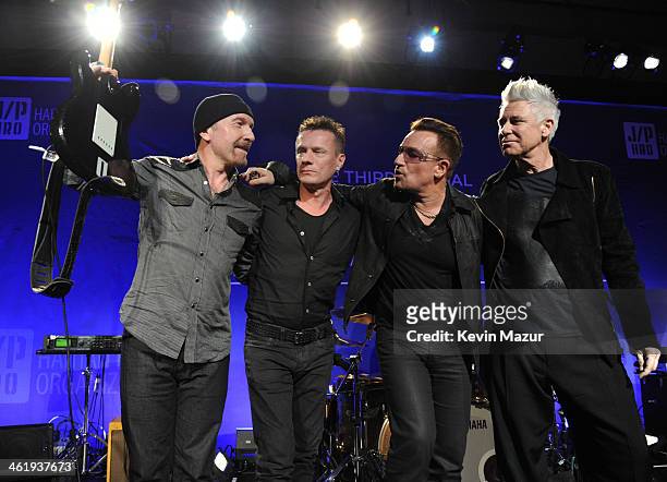 The Edge, Larry Mullen Jr., Bono and Adam Clayton perform onstage at the 3rd annual Sean Penn & Friends HELP HAITI HOME Gala benefiting J/P HRO...