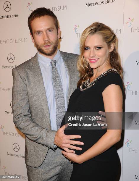 Actor Mark Webber and actress Teresa Palmer attend the Art of Elysium's 7th annual Heavan gala at Skirball Cultural Center on January 11, 2014 in Los...
