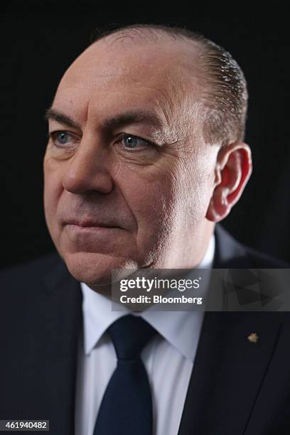 Axel Weber, chairman of UBS Group AG, poses for a photograph following a Bloomberg Television interview on day two of the World Economic Forum in...