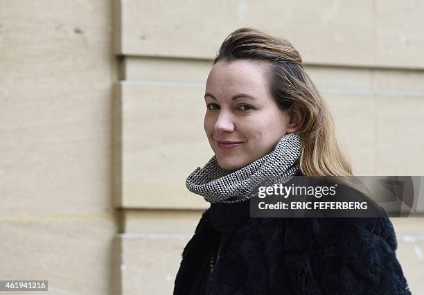 French Junior Minister for Digital Economy Axelle Lemaire smiles as she arrives at the Matignon Hotel in Paris for a ministers' meeting with the...