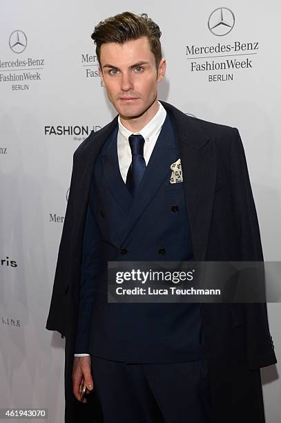 Paul-Henry Duval attends the Guido Maria Kretschmer show during the Mercedes-Benz Fashion Week Berlin Autumn/Winter 2015/16 at Brandenburg Gate on...