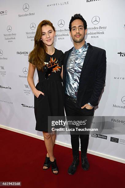 Sami Slimani and Stefanie Giesinger attend the Guido Maria Kretschmer show during the Mercedes-Benz Fashion Week Berlin Autumn/Winter 2015/16 at...