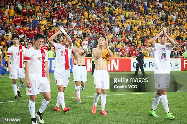 China's players acknowledge the crowd after the 2015 Asian Cup match between China PR and the Australian Socceroos at Suncorp Stadium on January 22,...