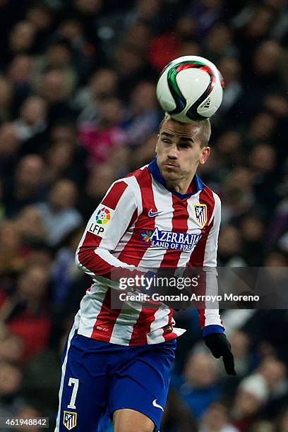 Antoine Griezmann of Atletico de Madrid saves on a header during the Copa del Rey Round of 16 second leg match between Real Madrid CF and Club...