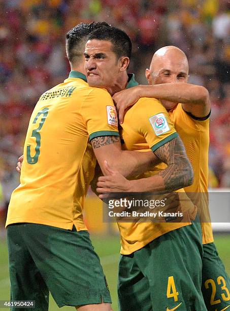 Tim Cahill of Australia celebrates with team mates after scoring a goal during the 2015 Asian Cup match between China PR and the Australian Socceroos...