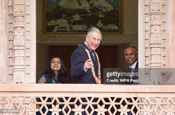 Prince Charles, Prince Of Wales looks out at the gardens during a tour of the Jain Temple on January 22, 2015 in Potters Bar, Hertfordshire, England....