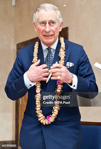 Prince Charles, Prince Of Wales during a tour of the Jain Temple on January 22, 2015 in Potters Bar, Hertfordshire, England. The Prince Of Wales was...