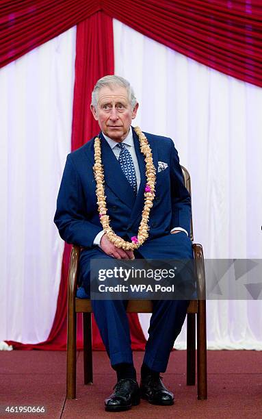 Prince Charles, Prince Of Wales listens to speeches during a tour of the Jain Temple on January 22, 2015 in Potters Bar, Hertfordshire, England. The...