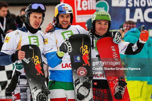 Andrey Sobolev of Russia takes 2nd place, Roland Fischnaller of Italy takes 1st place, Rok Marguc of Slovenia takes 3rd place during the FIS...