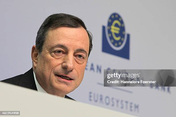 Mario Draghi, head of the European Central Bank , arrives to speak to journalists following a meeting of the ECB governing board on January 22, 2015...