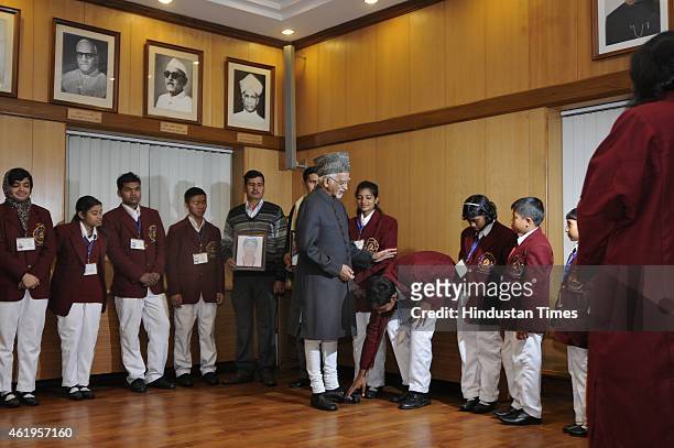 The Vice President Hamid Ansari meets the "National Bravery Award 2015" winning children, at his residence on January 22, 2015 in New Delhi, India....