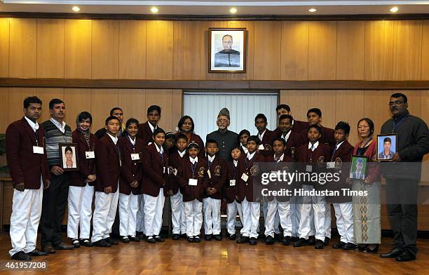 The Vice President Hamid Ansari in a group photo with the "National Bravery Award 2015" winning children, at his residence on January 22, 2015 in New...