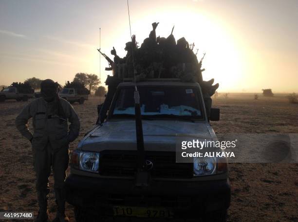 Soldiers of the Chadian army guard on January 21 at the border between Nigeria and Cameroon, some 40 km from Maltam, as part of a military contingent...