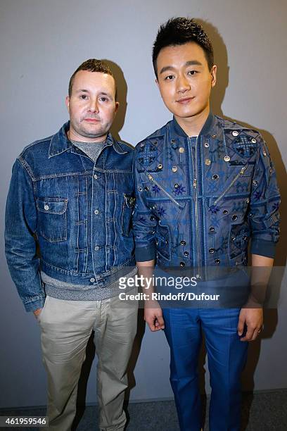 Fashion designer Kim Jones and Chinese actor Dawei Tong pose backstage after the Louis Vuitton Menswear Fall/Winter 2015-2016 Show as part of Paris...