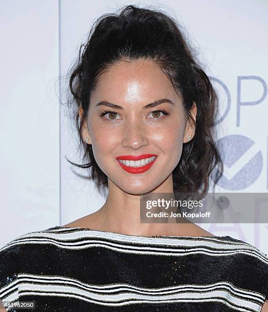 Actress Olivia Munn poses in the press room at The 41st Annual People's Choice Awards at Nokia Theatre L.A. Live on January 7, 2015 in Los Angeles,...