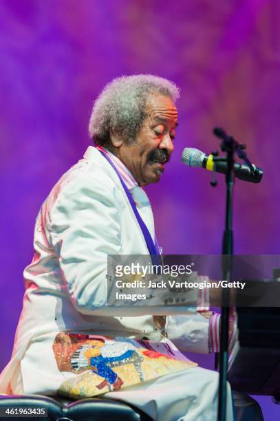 American R&B and Blues composer, musician, arranger and record producer Allen Toussaint sings and plays piano during a solo set at the 30th Annual...
