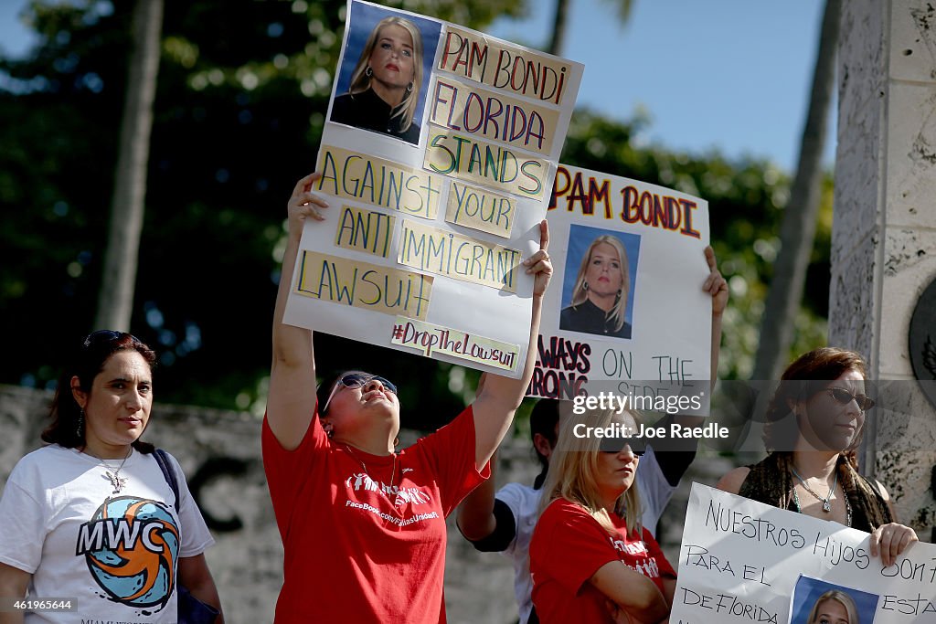 Activists Demonstrate Against FL's Attorney General Pam Bondi Backing Of Lawsuit Against Obama's Immigration Action
