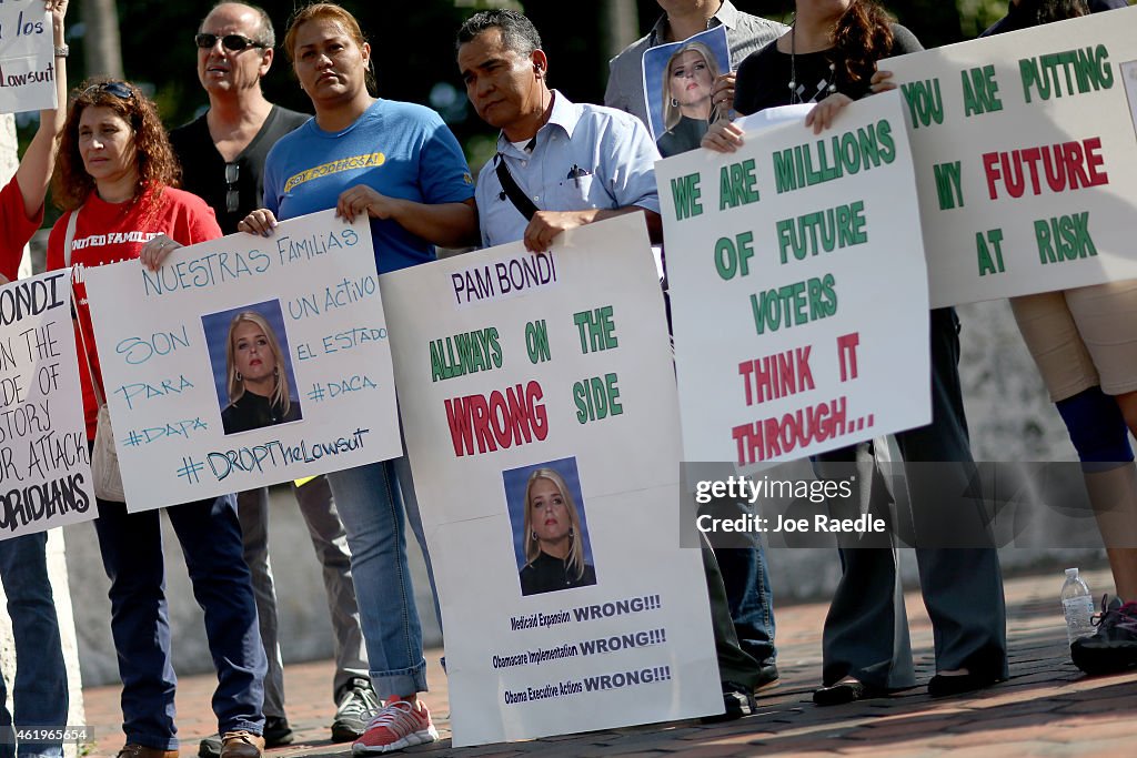 Activists Demonstrate Against FL's Attorney General Pam Bondi Backing Of Lawsuit Against Obama's Immigration Action