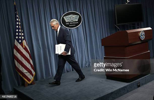 Secretary of Defense Chuck Hagel departs a press briefing at the Pentagon January 22, 2015 in Arlington, Virginia. The press briefing was believed to...
