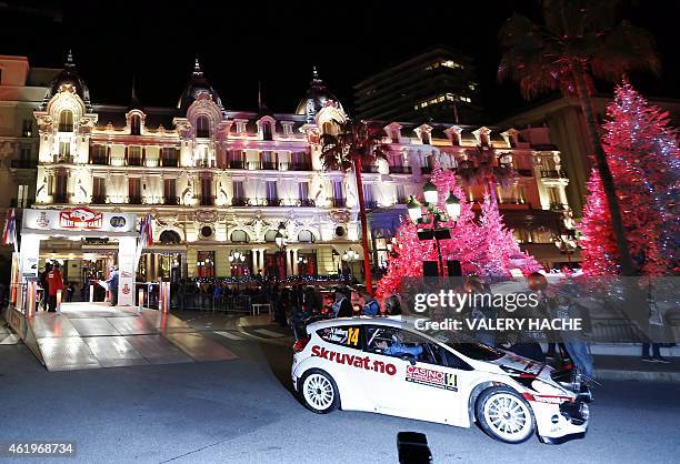 Norwegian pilot Henning Solberg takes the start of the Rallye of Monte-Carlo in Monaco, on January 22, 2015. AFP PHOTO / VALERY HACHE