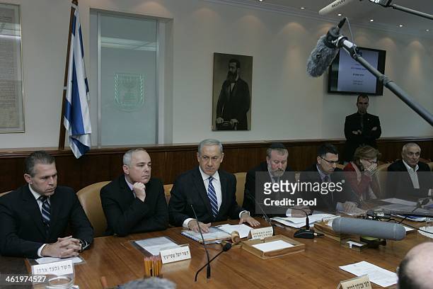 Israel's Prime Minister Benjamin Netanyahu arrives to chair the weekly cabinet meeting on January 12, 2014 in Jerusalem, Israel. Israel is mourning...