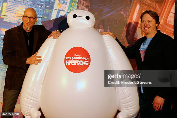Director Don Hall and the producer Roy Conli attend the " Big Hero 6" Paris premiere at UGC Cine Cite des Halles on January 22, 2015 in Paris, France.