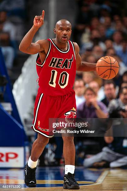 Tim Hardaway of the Miami Heat dribbles against the Golden State Warriors on November 26, 1996 at the Oakland Coliseum in Oakland, California. NOTE...