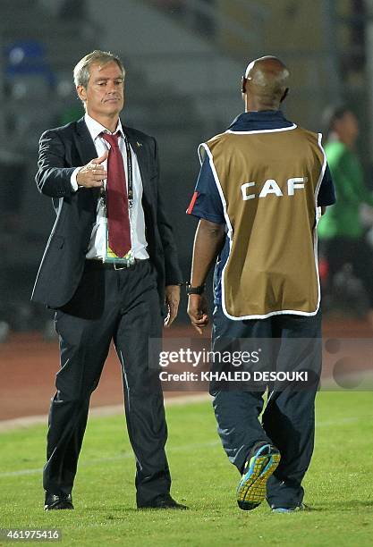 Democratic Republic of the Congo's coach Florent Ibenge walks towards Cape Verde's coach Rui Aguas to shake hands at the end of the 2015 African Cup...