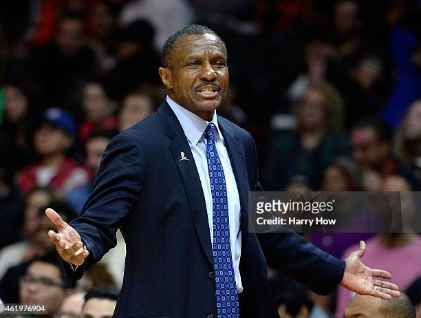 Dwane Casey of the Toronto Raptors complains to the referee during the first half against the Toronto Raptors at Staples Center on December 27, 2014...
