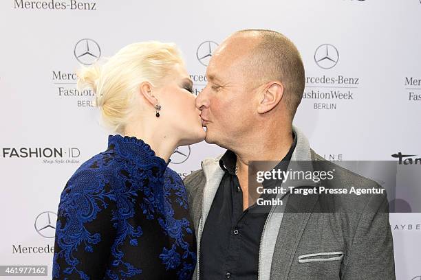 Melanie Mueller and Mike Bluemer attend the Irene Luft show during the Mercedes-Benz Fashion Week Berlin Autumn/Winter 2015/16 at Brandenburg Gate on...