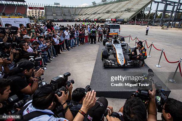 Sergio Perez poses for pictures during a walk through the Hermanos Rodriguez Racing Circuit Facilities on January 22, 2015 in Mexico City, Mexico....