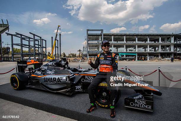 Pilot Sergio Checo Perez poses for pictures during a walk through the Hermanos Rodriguez Racing Circuit Facilities on January 22, 2015 in Mexico...
